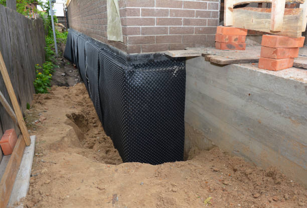 Happy homeowners after waterproofing job in Dresher